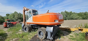 Excavator pe roti pentru fier vechi Atlas 1804