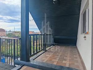 Casă individuală cu 2 apartamente și anexă generos de 100 mp - imagine 19