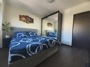 Dau spre închiriere apartament cu 3 camere în Pta. Iancului - imagine 2