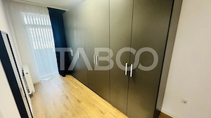Apartament modern 63mpu 3 camere 2 bai 2 parcari de vanzare Sibiu - imagine 4