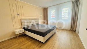 Apartament modern 63mpu 3 camere 2 bai 2 parcari de vanzare Sibiu