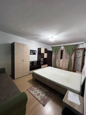 Apartament cu o cameră,decomandat,etaj intermediar,Nicolina-Podu Roș