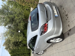 Opel Astra GTC 1.8 Benzină 125 CP   2005 | Buton Sport - imagine 3