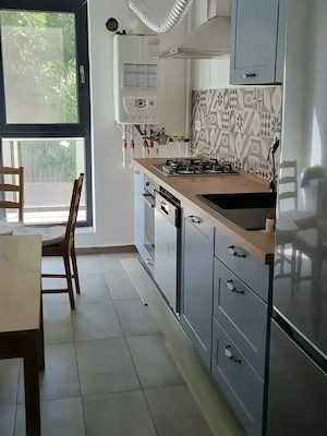 Închiriez  apartament cu 2 camere decomandat in bloc nou cu centrala proprie loc de parcare subteran