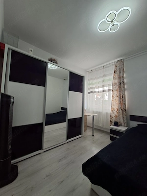 Apartament 2 camere part + gradina de 27 m pătrați+ parcare cadastrata decomandat Popesti -Leordeni  - imagine 9