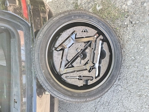 Rezerva de opel astra j slim subțire 5x105 cu tot cu supor si cric si cheie de roti la 500 lei tot s - imagine 3