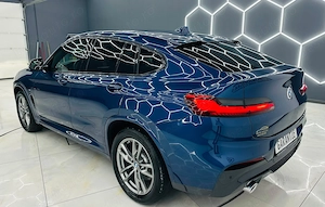 Bmw Seria X - imagine 4