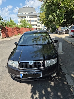 Skoda Fabia 1.4 16V 75 CP | 183.000 km | AC | Proprietar | Istoric service - imagine 8