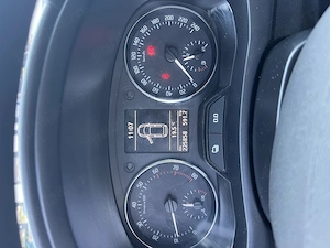 Skoda Roomster 2011 1.2 benzina - imagine 4