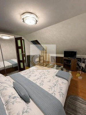 Se vinde apartament ( mansarda), 3 camere  74mp - imagine 2