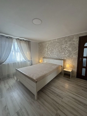 Inchiriez apartament cu 2 camere curte gradina si loc de parcare zona Fratelia