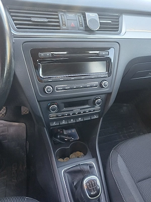 masina Skoda Rapid - imagine 1