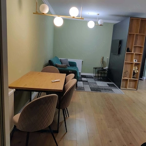 Dau în chirie apartament în Florești la BMW - imagine 4