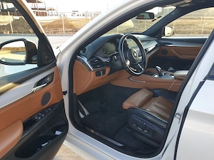 masina BMW X6 M50D