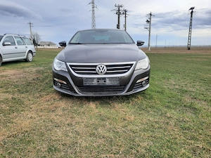 Vw Passat CC an 2011 motor 2.0 cm3 benzina 211CP cutie manuala 