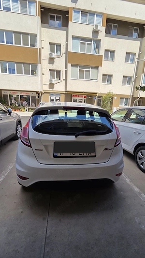 Vând Ford Fiesta, an fabricație 2013, motor 1.5 TDCi diesel (1.499 cm ), cutie manuală, culoare albă - imagine 5