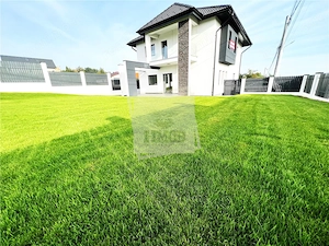 Casa moderna 5 camere 2 bai teren 498 mp 4 parcari 10 km de Sibiu