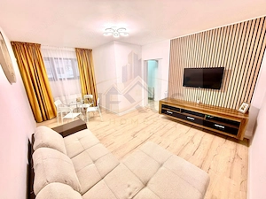 Apartament 2 camere- 10 minute metrou- demisol - imagine 2