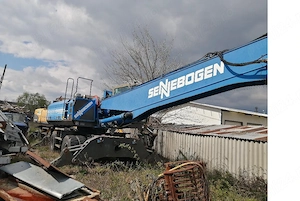 Excavator pe pneuri marca SENNEBOGEN  835