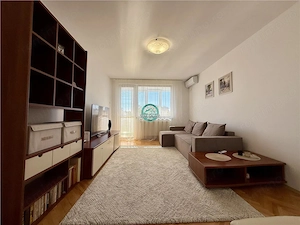 Apartament cu 2 camere mobilat si utilat, situat semicentral