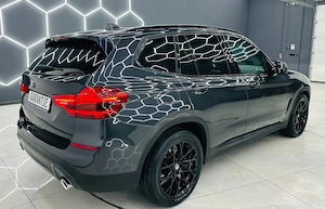 Bmw Seria X - imagine 4