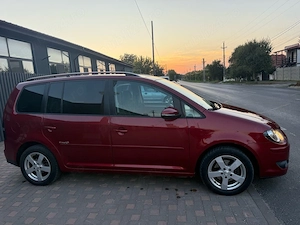 vand volkswagen touran cu 7 locuri 