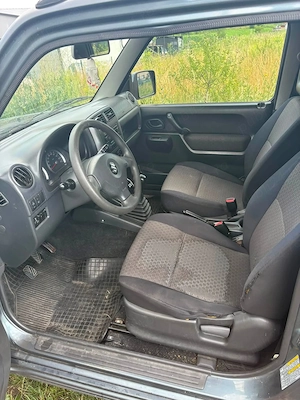 Suzuki Jimny 2007   4x4 la buton, ideal pentru off-road și oraș - imagine 4