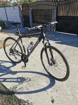 Vând bicicleta merida