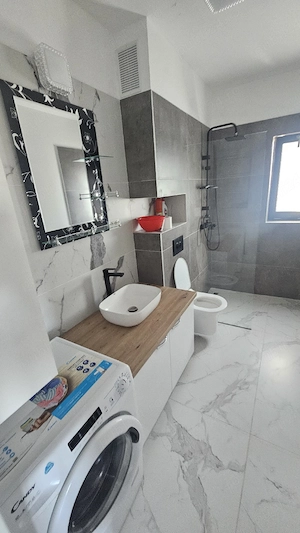 Va propun spre închiriere un apartament modern cu 2 camere - imagine 10