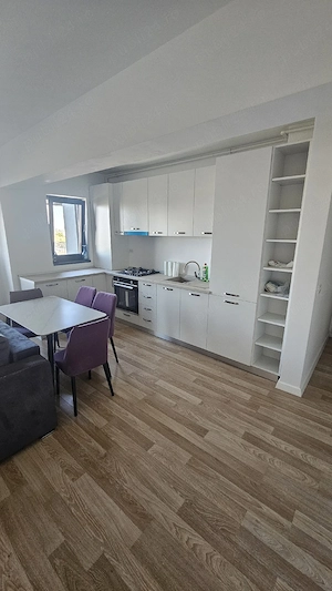Va propun spre închiriere un apartament modern cu 2 camere - imagine 7