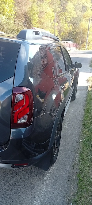Schimb Dacia Duster 2x4 - imagine 5