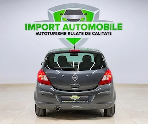 Opel Corsa 1.4 16V Active - imagine 7