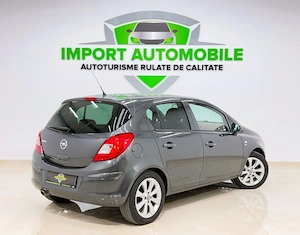Opel Corsa 1.4 16V Active - imagine 6