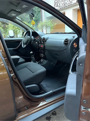 Dacia Duster fabricație 2012, echipată cu motorul fiabil 1.5diesel de 110 CP și tracțiune integrală  - imagine 8