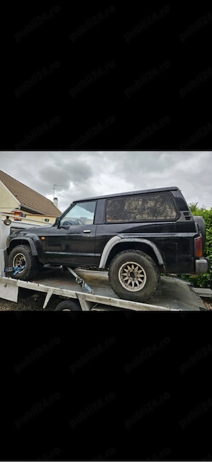 Dezmebrez Nissan Patrol  - imagine 2