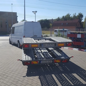  Șofer profesionist transport internațional persoane și colete 