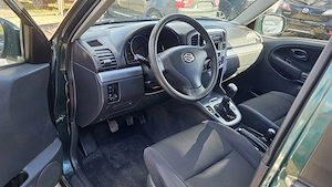 Suzuki Grand Vitara 2.0 benzina - imagine 13