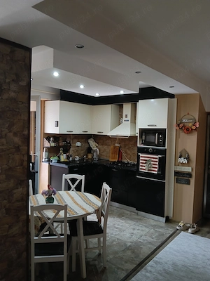 Se vinde apartament cu 4 camere modificat modern gata de mutat  - imagine 2