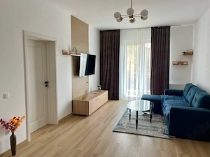PRIMA ÎNCHIRIERE! Apartament nou cu 2 camere, terasă și 2 locuri de parcare privată