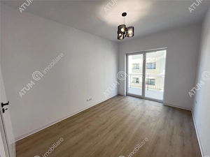 Apartament la cheie 2 camere balcon boxa parcare zona Brana Selimbar - imagine 3