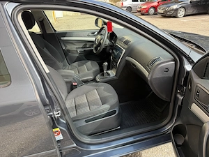Skoda Octavia Facelift 1.2 benzina euro 5, proprietar, 149.300 Km carte service - imagine 8