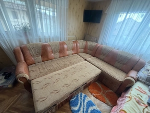 Colțar extensibil cu ladă de depozitare   confortabil și practic + fotoliu GRATIS