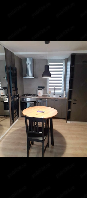 Închiriez apartament 2 camere  - imagine 2