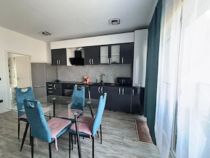 Persona fizica inchiriez apt spatios 2 camere in Ghiroda - imagine 2