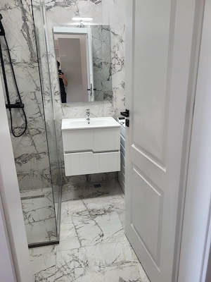 Închiriez apartament cu parcare subteranâ - imagine 4