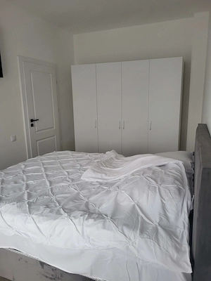 Închiriez apartament cu parcare subteranâ - imagine 2