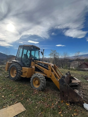 Vand Buldoexcavator Komatsu WB97R 1997