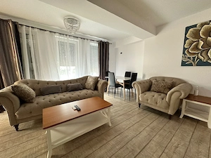 Apartament de închiriat   3 camere, 2 băi, loc de parcare inclus