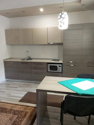 Dau în chirie apartament 2 camere - imagine 2