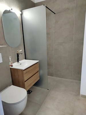 Închiriez apartament 2 camere - imagine 2